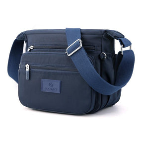 Bolsa Compacta em Nylon Resistente à Água e Fechamento em Zíper - Inova Mix Store Bolsa Compacta em Nylon Resistente à Água e Fechamento em Zíper